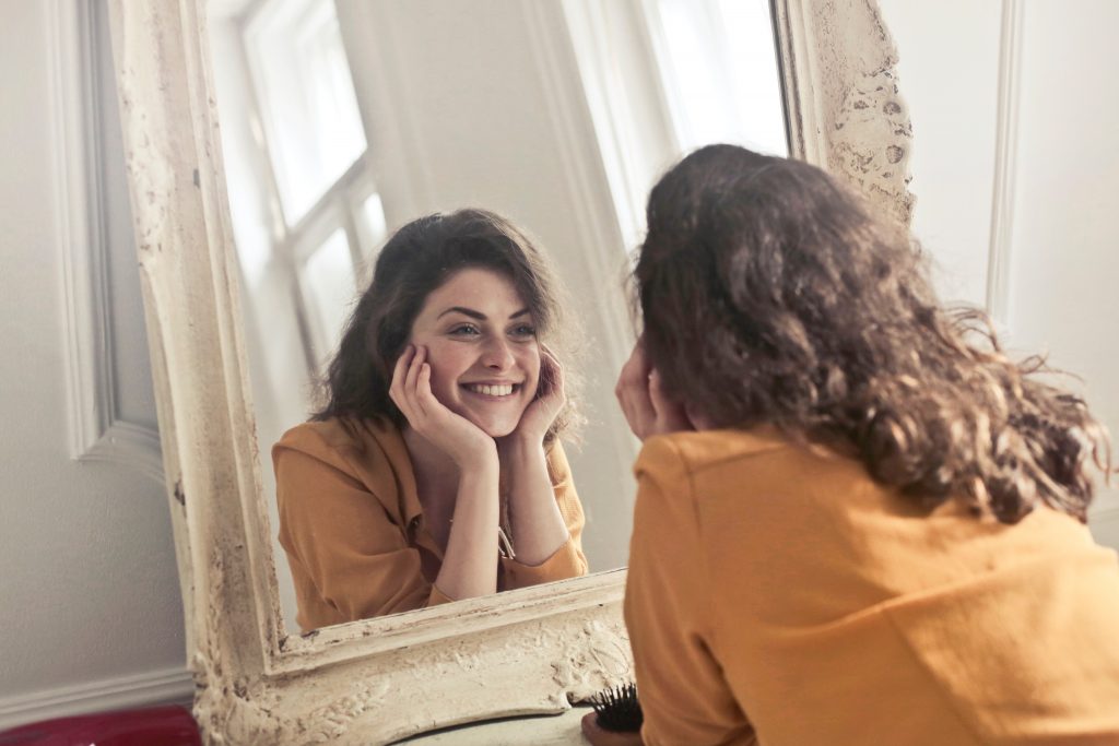 woman happy with herself